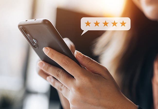 Woman giving feedback with her phone