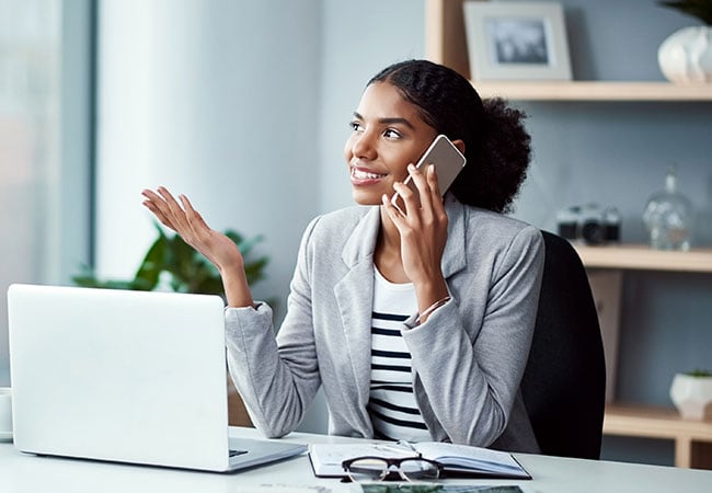 Woman listening to customer on the phone