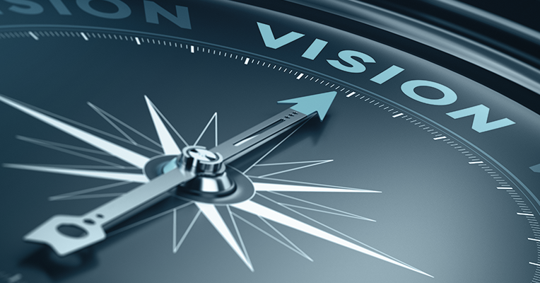 Compass pointing to the word VISION