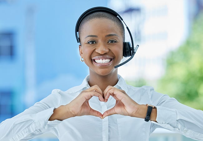 Contact centre staff making a heart shape