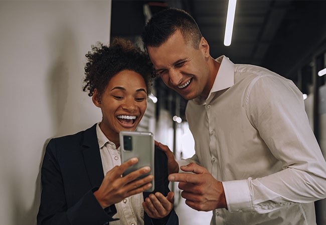 Office friends sharing a laugh