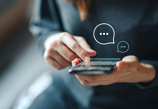 Woman completing a survey on their phone